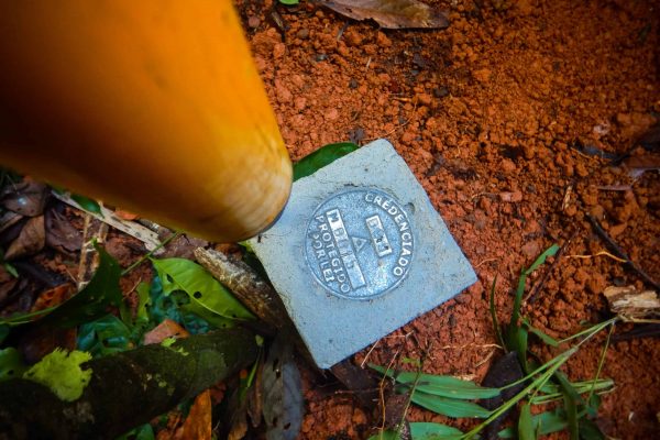 A metal seal confirming the protected status of the Rosewood project.