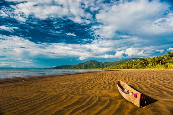 A canoe on the beach in the Pacific Forest Communities, Colombia.